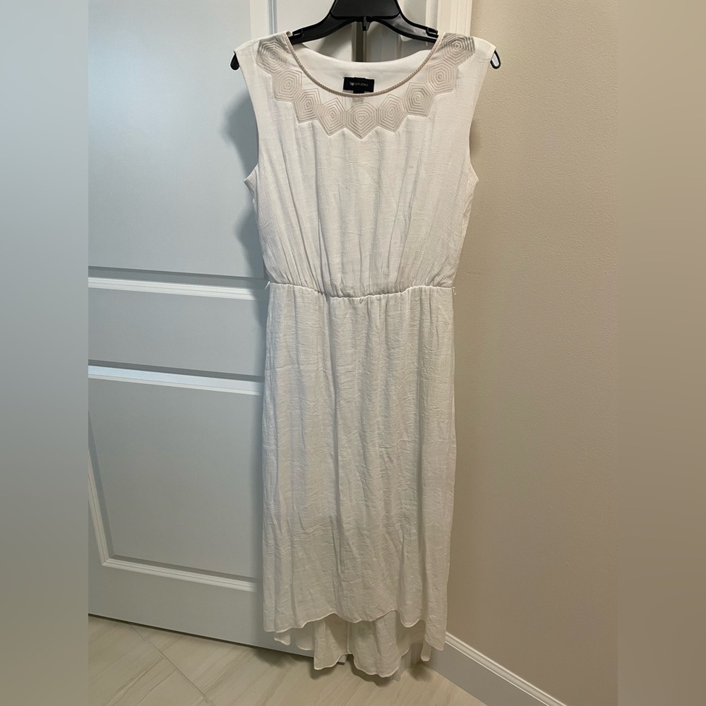 Brand new without tags High Low Hem Mullet Sleeveless Dress